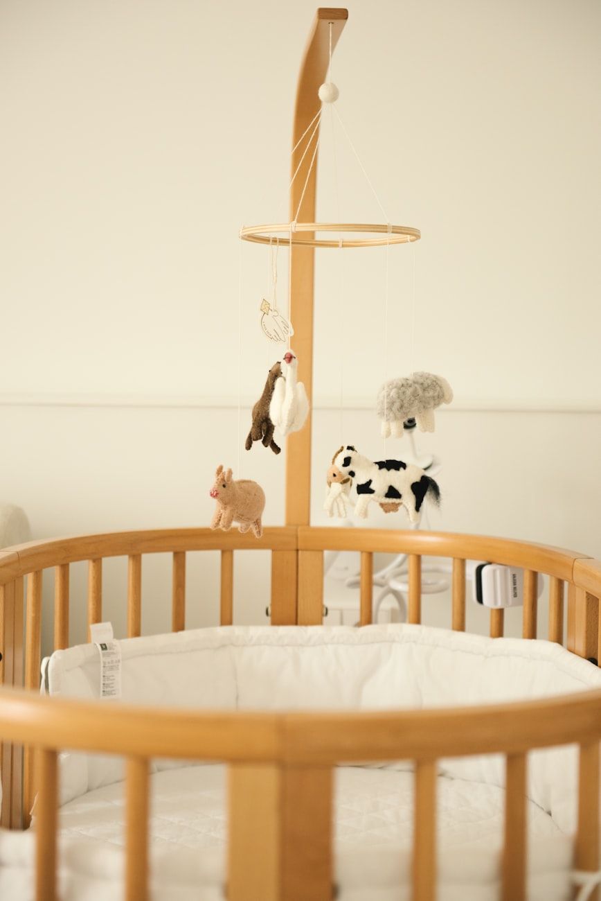 musical crib mobiles, baby sleep aid, nursery essentials, baby mobile benefits, soothing baby music, crib accessories, newborn sleep tips, baby development toys, lullaby mobile, baby gift ideas