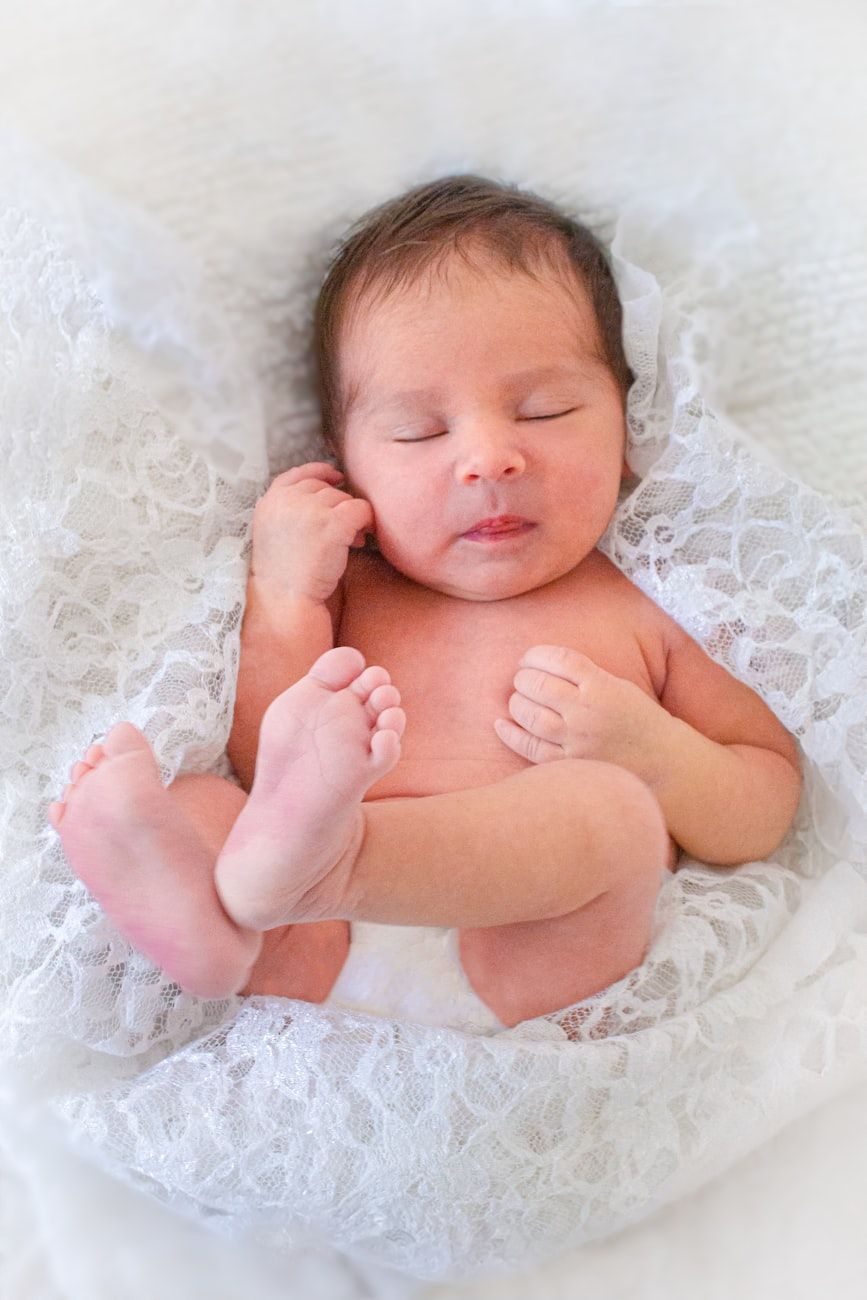 newborn nest, baby lounger, infant comfort, safe sleep, baby support, mom must-have, newborn essentials, baby gear, parenting tips, baby sleep aid