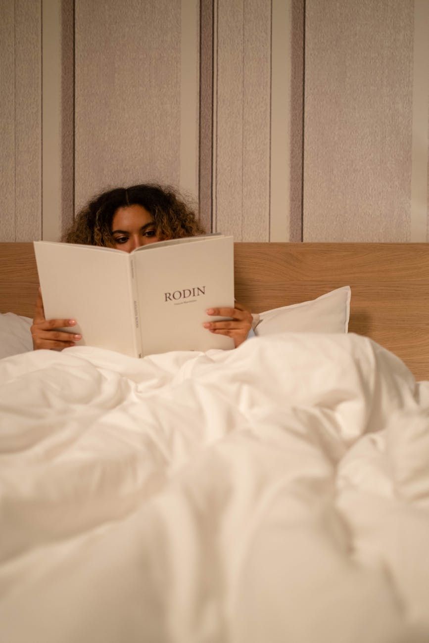 bedtime reading, self-improvement, productivity books, sleep habits, positive thinking, nighttime routine, personal development, motivation, reading habits, mental wellness
