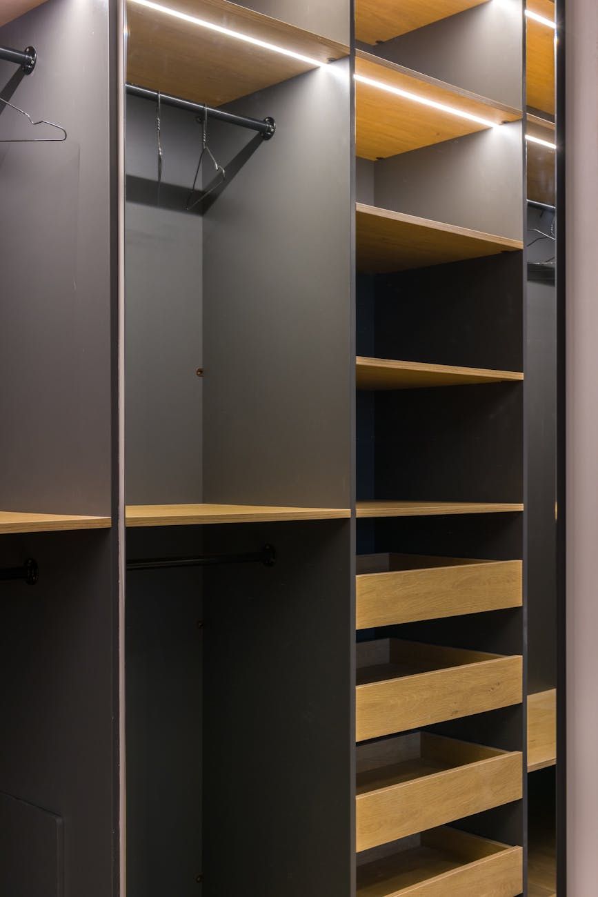 closet lighting ideas, wardrobe lighting solutions, LED closet lights, lighting for storage areas, wardrobe illumination tips, motion sensor closet lights, built-in closet lighting, energy efficient closet lighting, how to light a wardrobe, closet organization lighting