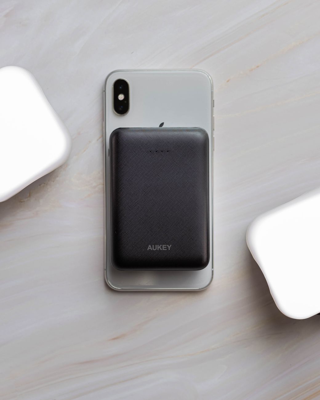 magnetic power bank, MagSafe power bank, compact charger, wireless charging, smartphone battery, portable charger, overheating protection, charging efficiency, battery capacity, fast charging