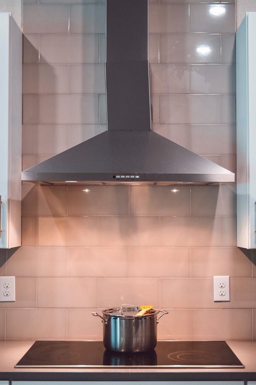 quiet range hoods, noise reduction kitchen hoods, silent extractor fan, low noise ventilation, modern kitchen appliances, smart range hood technology, ductless range hood quiet, powerful quiet kitchen hood, kitchen air purification system, advanced ventilation systems
