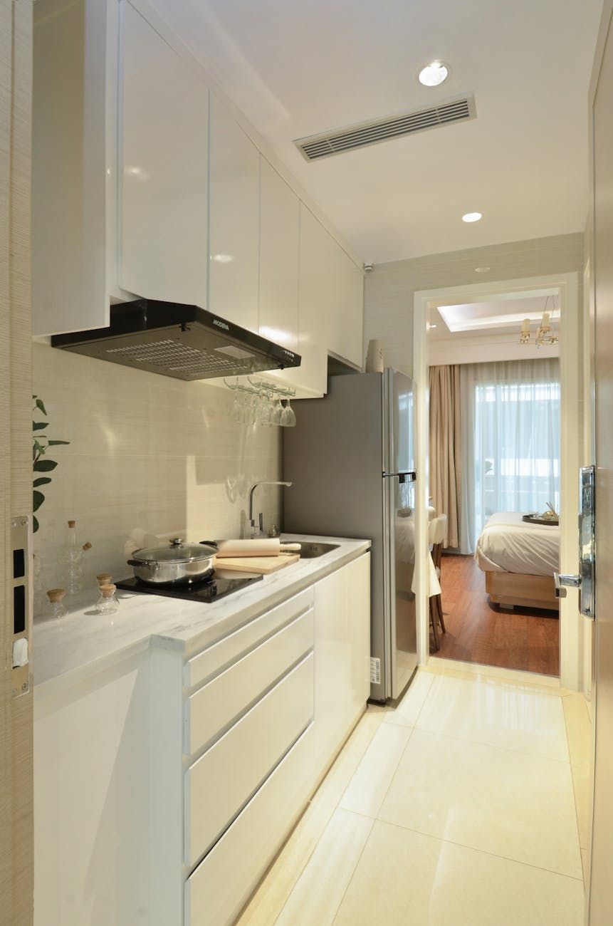 afzuigkap, luchtkwaliteitssensoren, slimme keuken, frisse lucht, automatische ventilatie, geurcontrole, kookdampen, moderne apparaten, handsfree bediening, keukentechnologie
