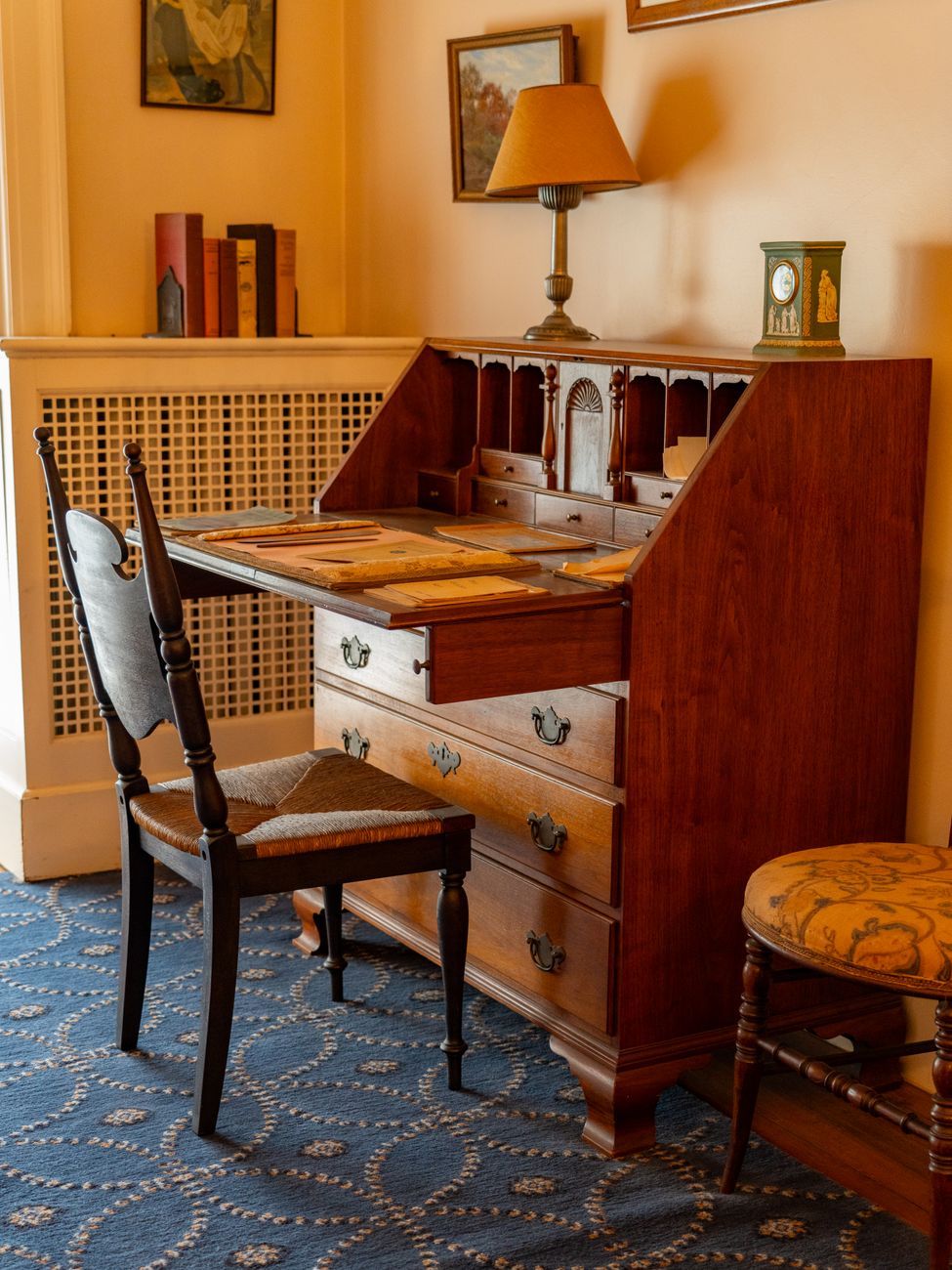 secretary desk, home office furniture, compact desk, vintage furniture, space-saving desk, fold-down desk, small home office, multifunctional furniture, classic desk design, home office trends