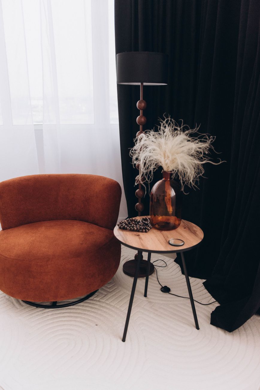 swivel armchair, living room chair, rotating armchair, modern furniture, comfortable seating, accent chair, 360-degree swivel chair, living room trends, contemporary interior, cozy furniture